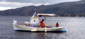The &lsquo;committee boat&rsquo; sits waiting during the first day of the 2009 Greek Sails Round the Island race, Poros, Greece