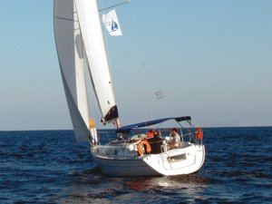 A Greek Sails Jeanneau Sun Odyssey 32i sailing yacht &lsquo;goose winging&rsquo; during a flotilla sailing holiday