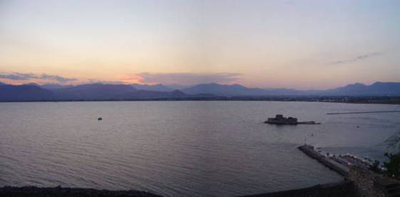 Sailing holiday locations in Greece: Looking north east across the head of the Argolic Gulf with Bourtzi fort guarding the entance to the harbour