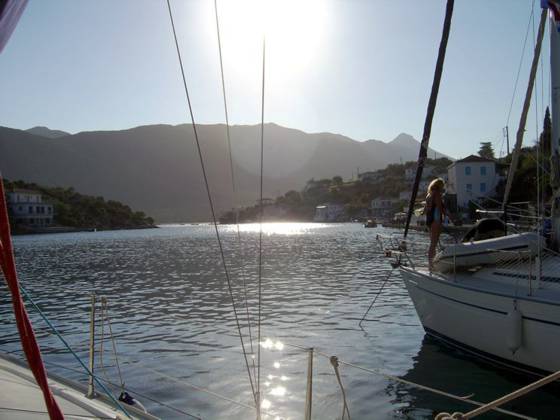 Sailing holiday locations in Greece: Looking up the &lsquo;fjord&rsquo; at Y&eacute;rakas with the village to the right and the salt water lagoon beyond through the narrows