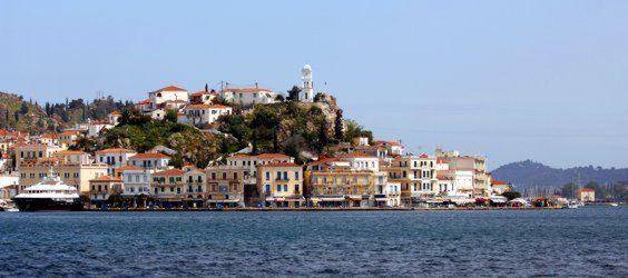 The Poros waterfront viewed from Lim&iacute;n P&oacute;ros, described in Rod Heikell&rsquo;s West Aegean pilot guide as; &ldquo;one of the most attractive in Greece...&rdquo;.  What better place to start and end your sailing holiday!