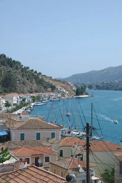 View of the south channel with Greek Sails&rsquo; flotilla & bareboat yacht charter base visible at the end of the quay to the right, Poros, Greece