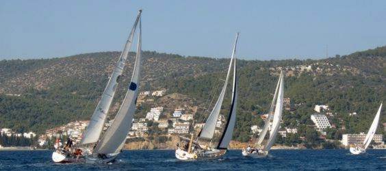 Yachts race &lsquo;round the cans&rsquo; on the first day of the 2008 Greek Sails Round the Island race, Poros, Greece